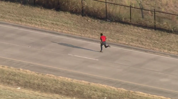 Suspect running from Dallas Police after car crash 