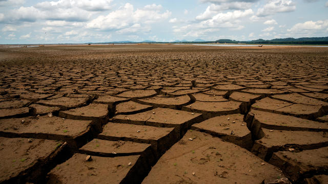 Global warming concept . Dry cracks in the land, serious water shortages. Drought concept. 