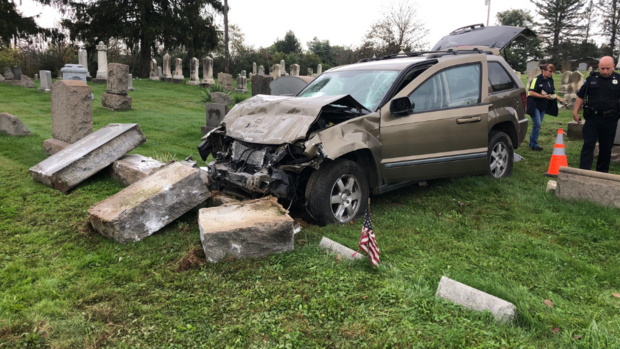 cranberry car into cemetery 