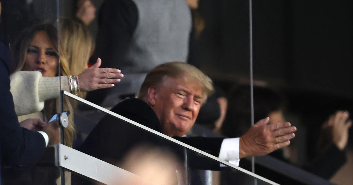Donald Trump does tomahawk chop with Braves fans at World Series