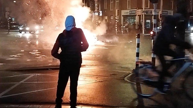 A fire burns on a street in Hague 