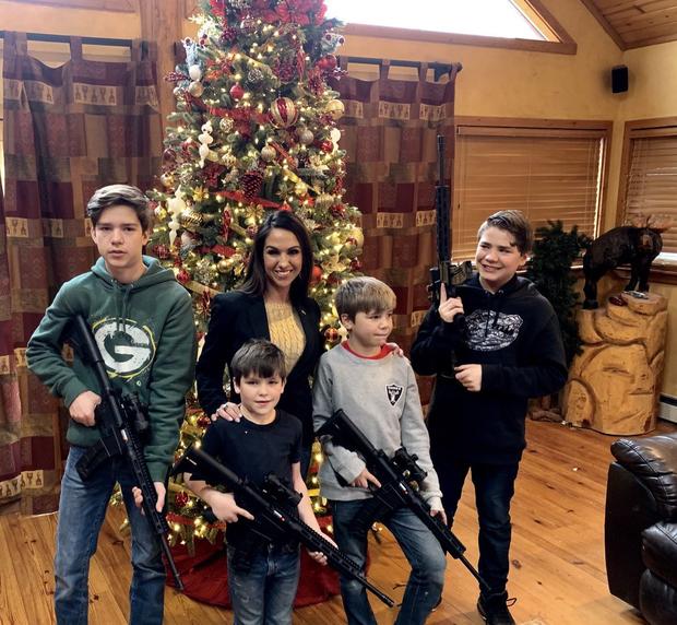 lauren boebert family with guns christmas photo 