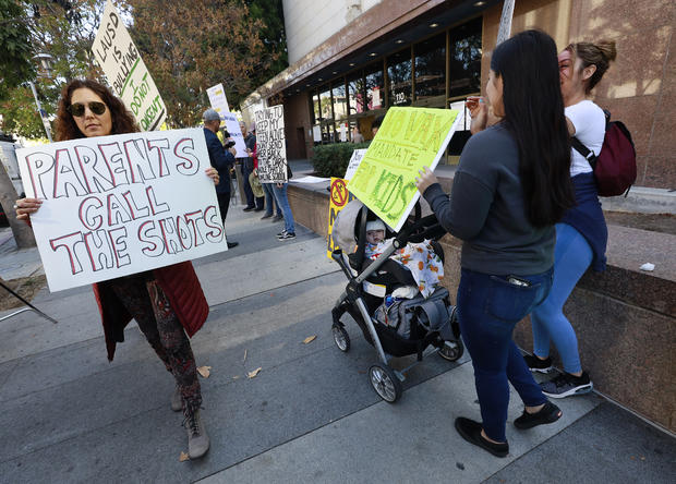 Members of Los Angeles Leftists for Choice and Unity held a rally against the Los Angeles Unified School District's student COVID-19 vaccination mandate outside the Stanley Mosk Courthouse Wednesday morning. 