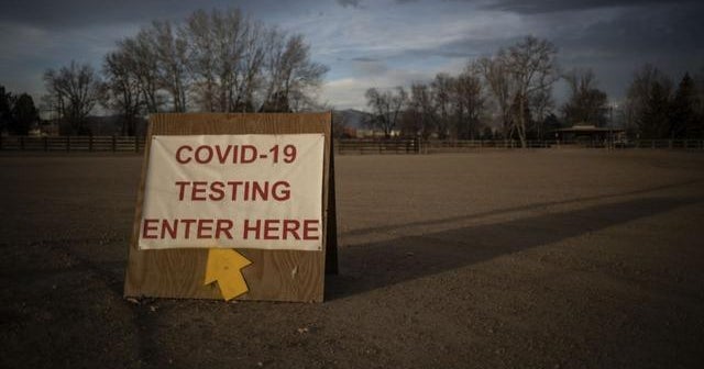 COVID-19 cases skyrocket as Delta and Omicron variants spread - CBS News