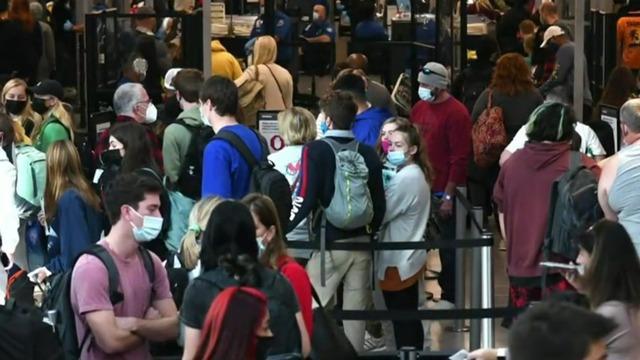 cbsn-fusion-omicron-variant-causes-holiday-travel-chaos-as-thousands-of-flights-have-been-cancelled-thumbnail-863551-640x360.jpg 