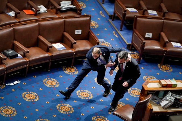 Lawmaker evacuates the House Chamber during January 6 Capitol riot 