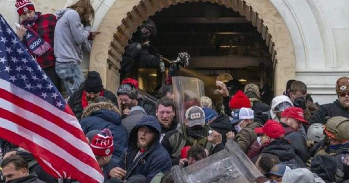 Nation marks anniversary of deadly attack on U.S. Capitol - CBS News