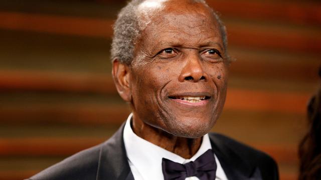 FILE PHOTO: Actor Sidney Poitier arrives at the 2014 Vanity Fair Oscars Party in West Hollywood 