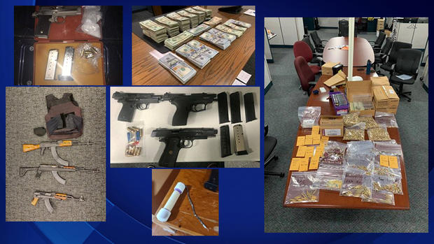 FBI gang raids weapons drugs cash 