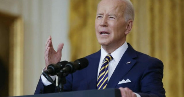Biden marks first year in office as agenda stalls - CBS News