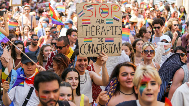 A participant seen holding a placard expressing his opinion 