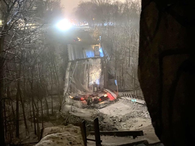 Vehicles are seen in a pileup after a bridge collapsed in Pittsburgh on January 28, 2022.