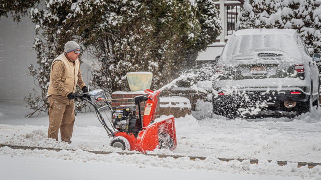 A man seen snow shoveling a driveway. Tappan got blanketed 