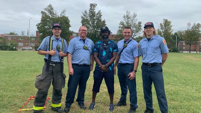 Ed-Reed-with-firefighters.jpg 