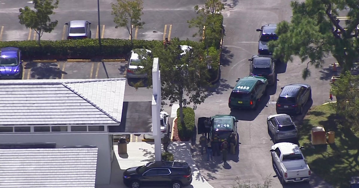 Police Standoff Ends After Machete Wielding Bank Robbery Suspect Tosses 
