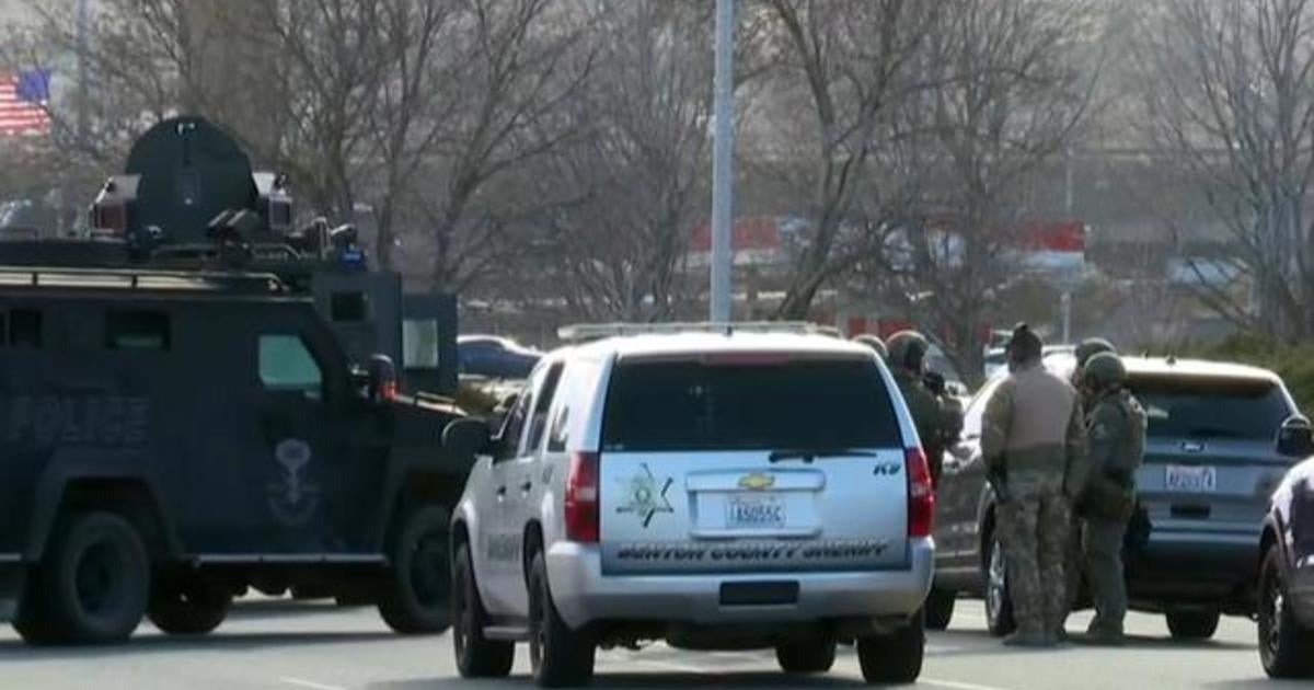 Manhunt underway after fatal grocery store shooting - CBS News