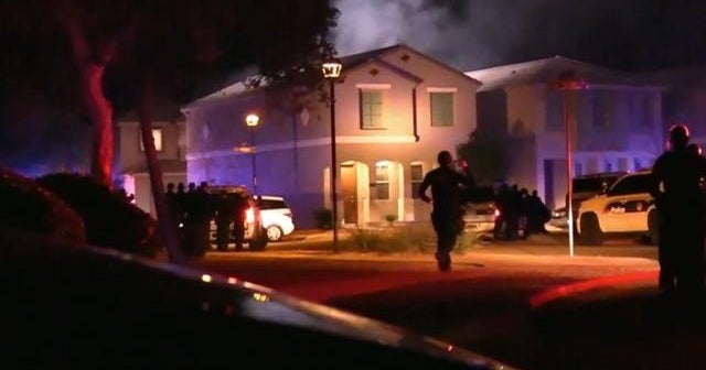 Woman killed, officers hurt in standoff with gunman in Phoenix - CBS News