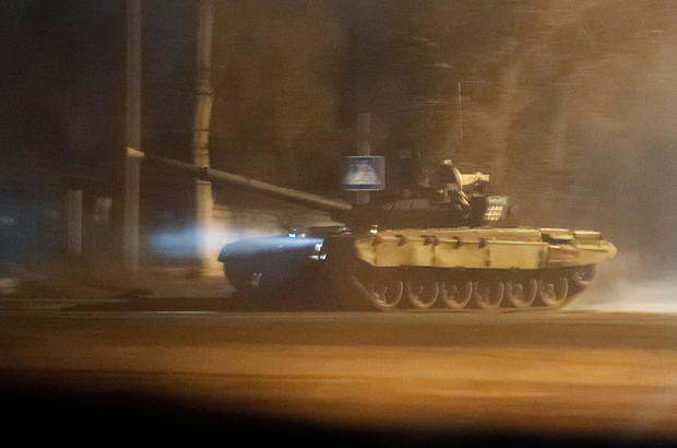A tank drives along a street in Donetsk 