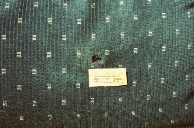 Bullet hole in sofa 