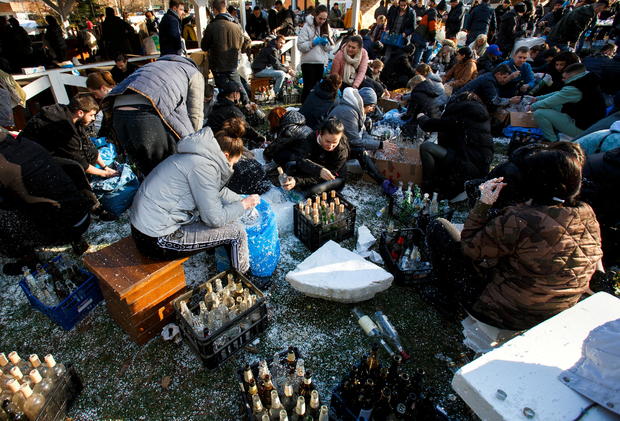 Local residents prepare Molotov cocktails to defend the city of Uzhhorod 