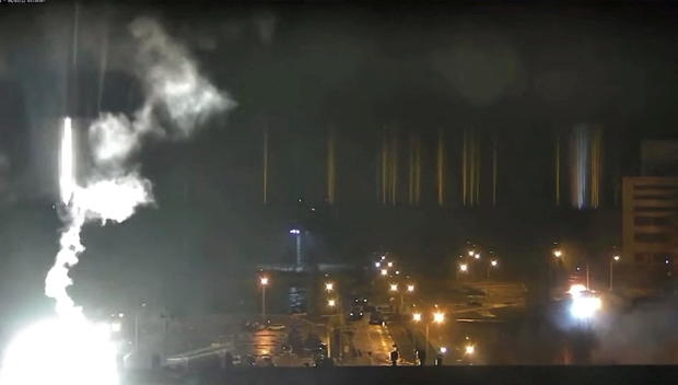 Surveillance camera footage shows a flare landing at the Zaporizhzhia nuclear power plant during shelling in Enerhodar 