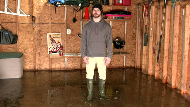 Nick Bradley in his flooded St. Paul garage 