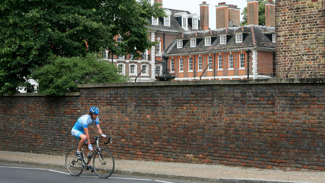 A cyclist rides past Witanhurst House in London, U.K., Thurs 