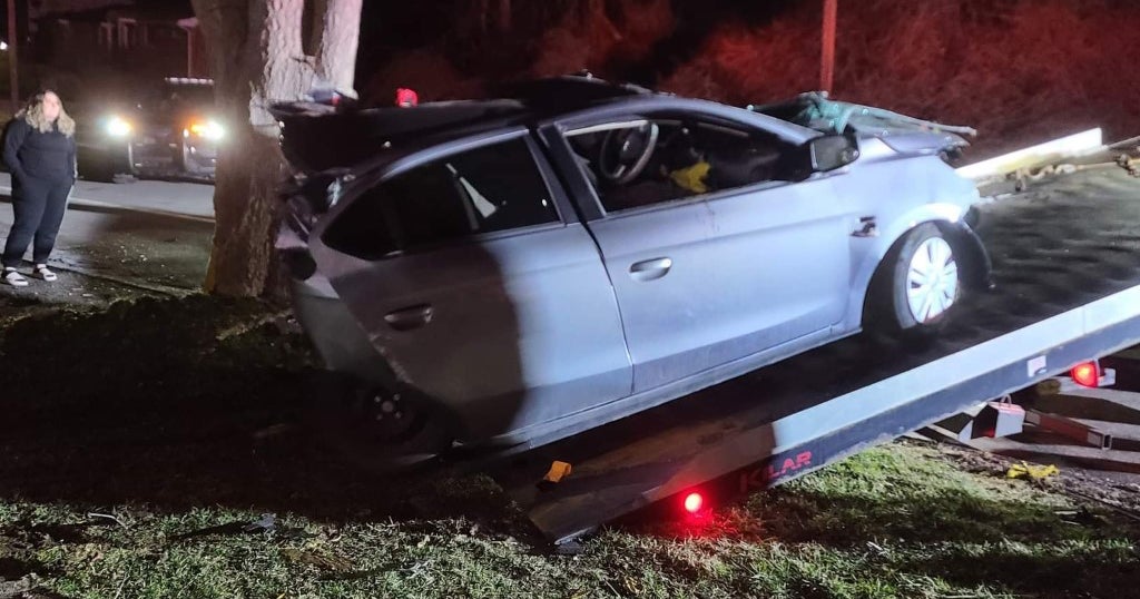 Driver Rescued From Car After Crashing Into Three Parked Vehicles - CBS ...