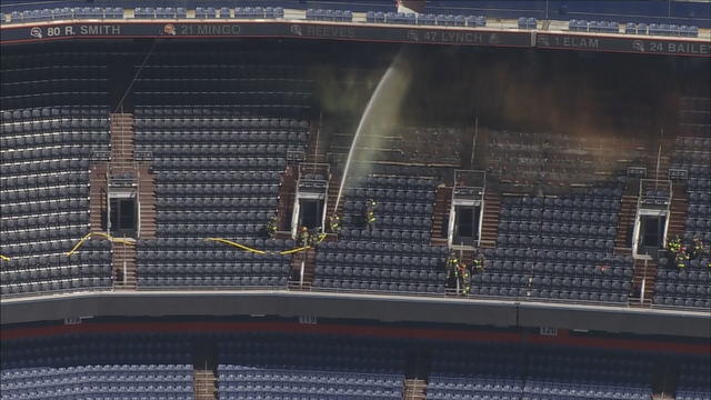 Fire Burns Seats Inside Of Empower Field At Mile High