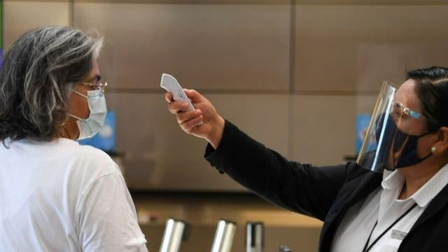 cbsn-fusion-moneywatch-airline-ceos-push-to-drop-covid-19-protocols-thumbnail-943164-640x360.jpg 