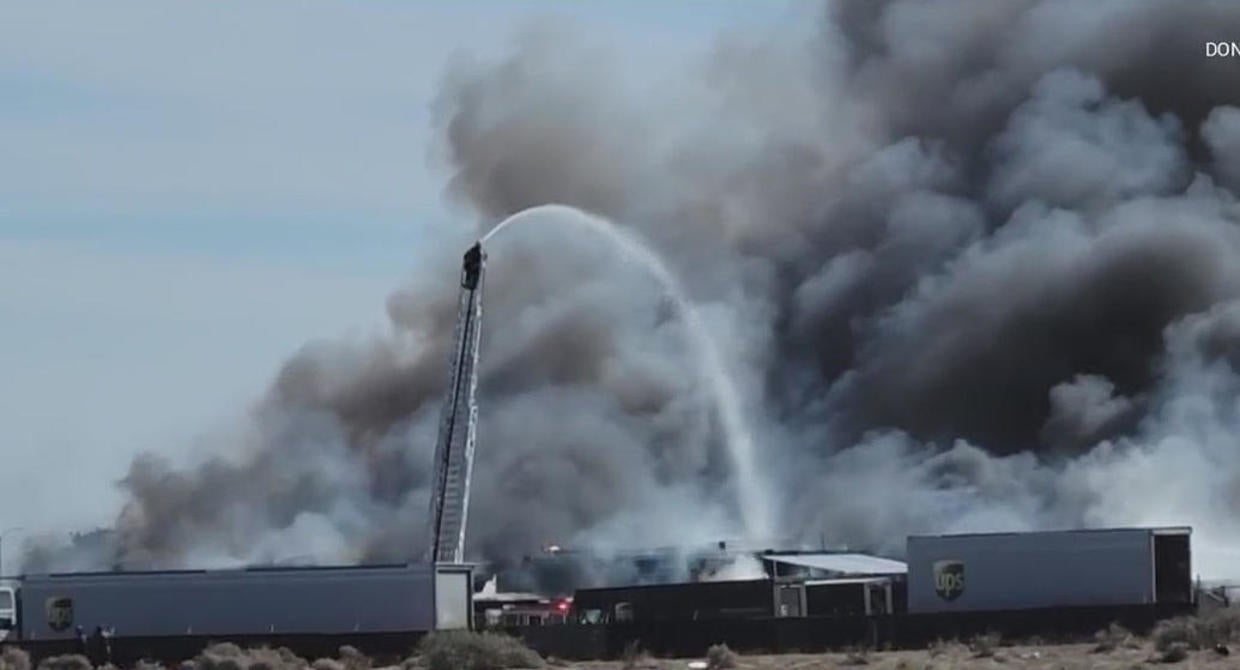 Second-alarm fire burns UPS warehouse, big rig trailers in Lancaster ...