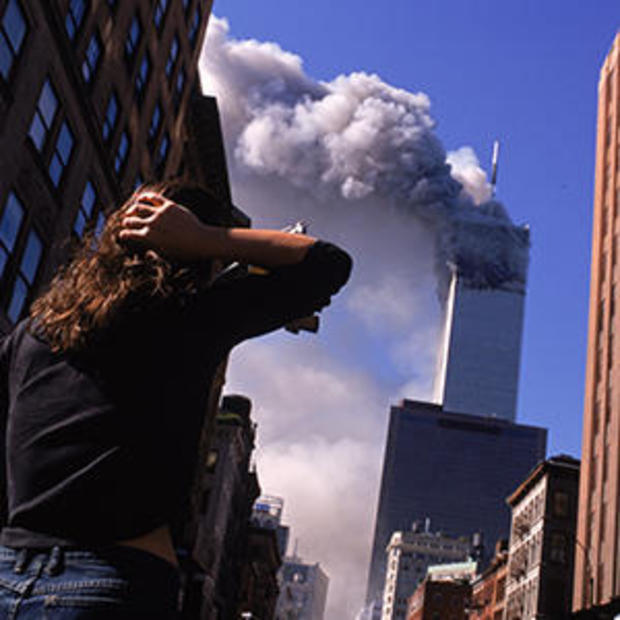 Shocked New Yorker Watches the World Trade Center on September 11, 2001 