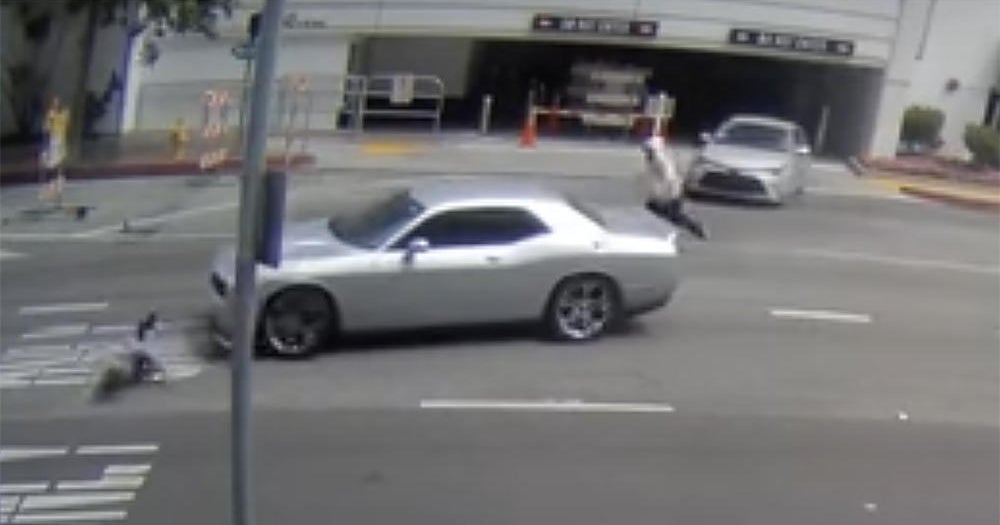 Caught on video: 2 men rob woman of her watch after hitting her with ...