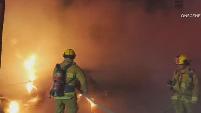 Fire tears through building in South LA 
