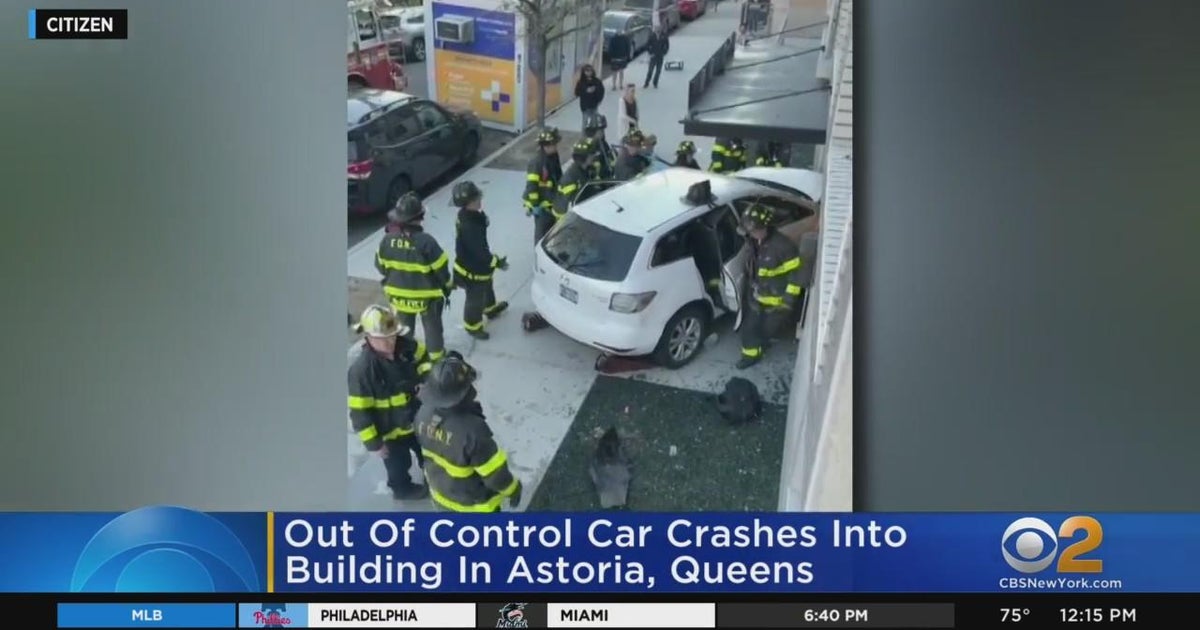 Car slams into building in Astoria, Queens - CBS New York