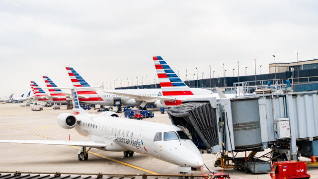 American Airlines planes finishing up for take-off at gate 