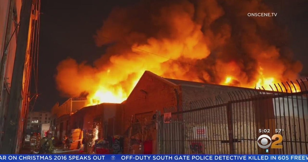 Large fire rips through downtown LA commercial building for second time ...