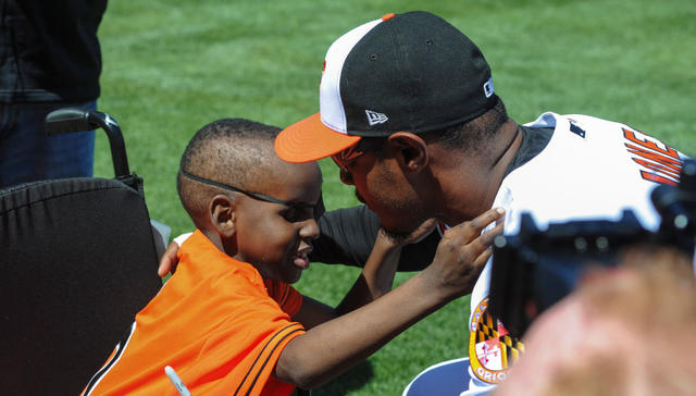 Baltimore Orioles - Adam Jones with O's superfan, Mo Gaba