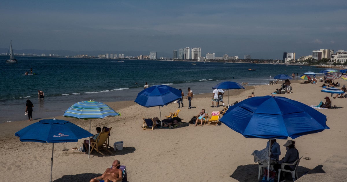 Suspected cartel gunmen abduct 2 female soldiers vacationing on beach in Mexico: "A cowardly act" - CBS News