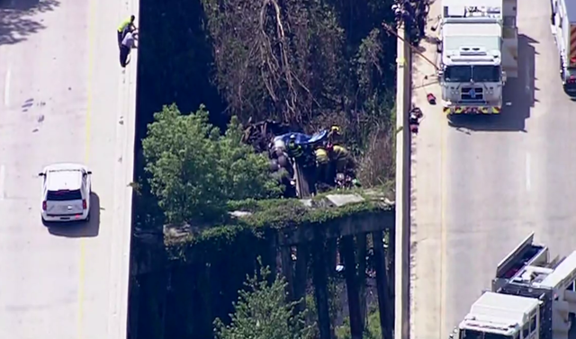 Dump truck crashes between bridges in Edgewater