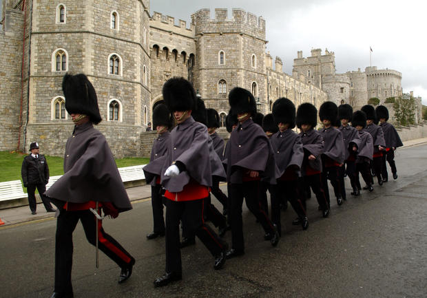 Coldstream guards march in front of Wind 