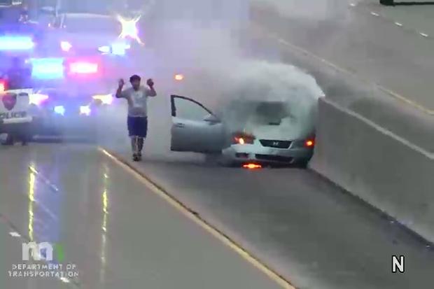 Person exits flaming car on Highway 100 