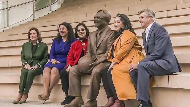 Dignitaries Pose Next to Statue of Ed Lee 