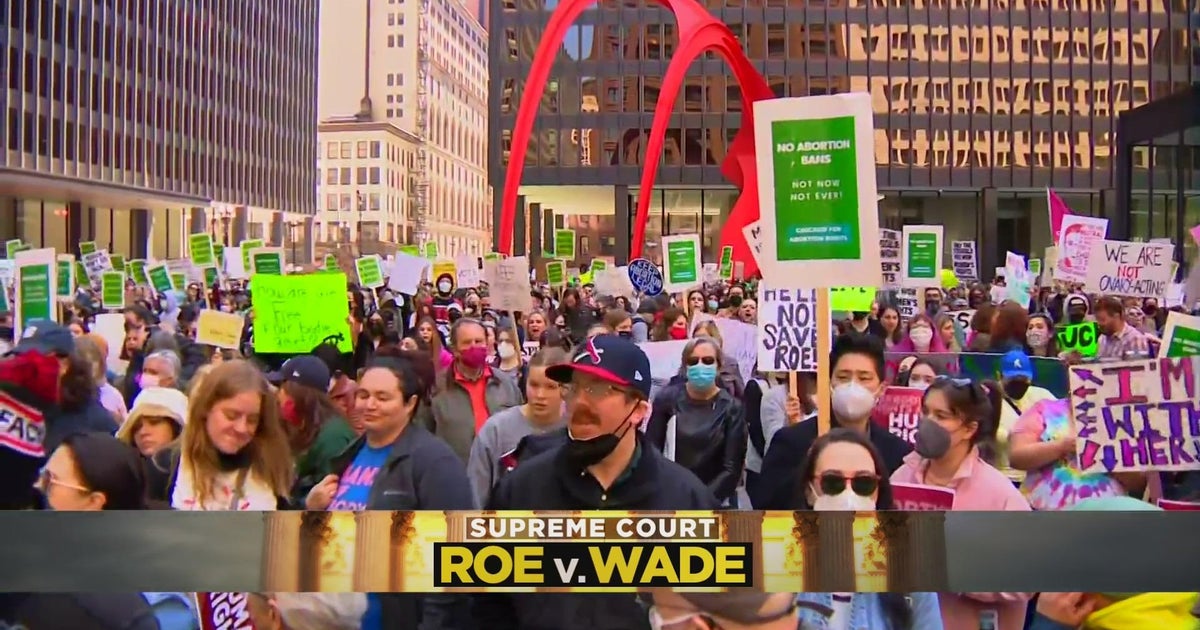 Hundreds march through downtown Chicago in protest after leak of Roe v