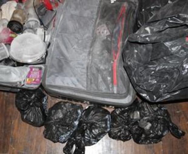 packages-of-suspected-heroin-seized-during-investigation.jpg 