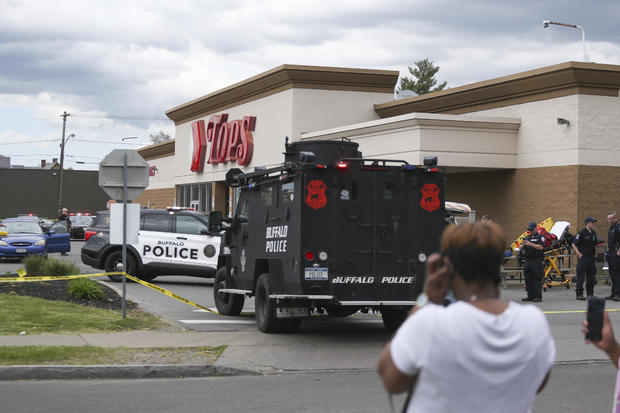 Police vehicles at Buffalo supermarket shooting scene 