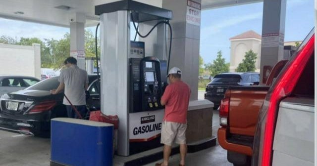 MoneyWatch: High gas prices cause Americans to cut back on spending ...