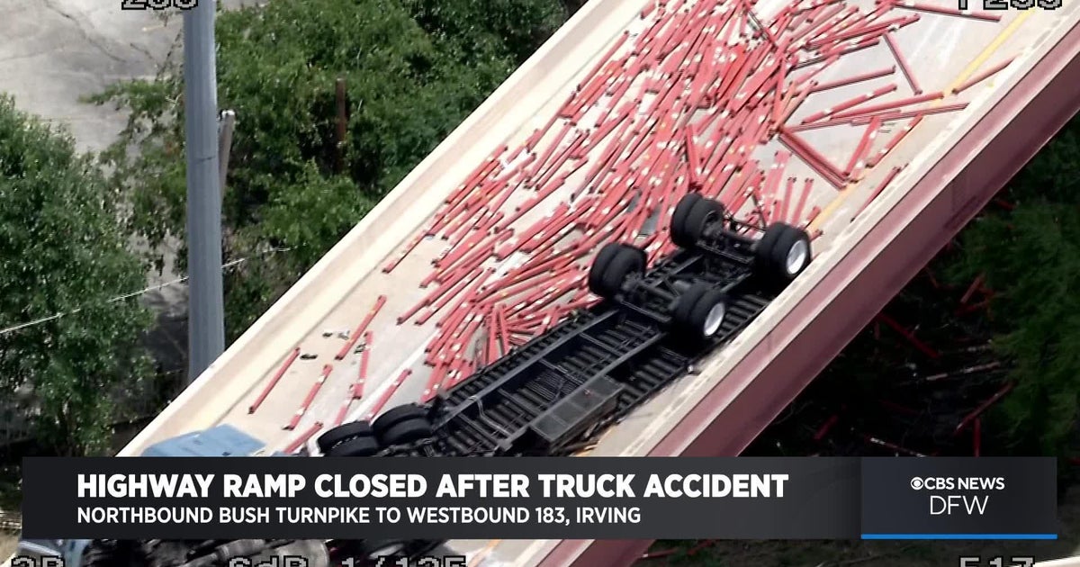 Truck wreck, debris spill closes highway ramp in Irving - CBS Texas