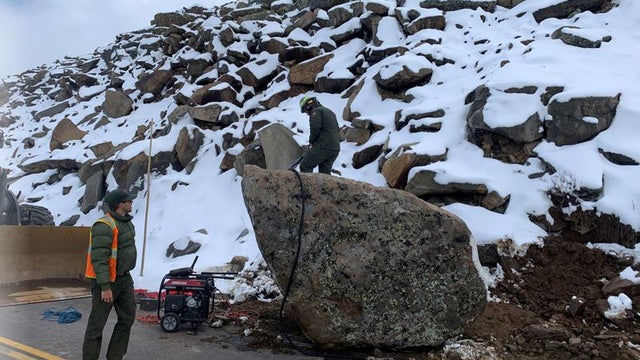 RMNP-Trail-Crew-working-on-Large-Boulder-in-the-road-on-Trail-Ridge-Road_6-1-22-copy.jpg 
