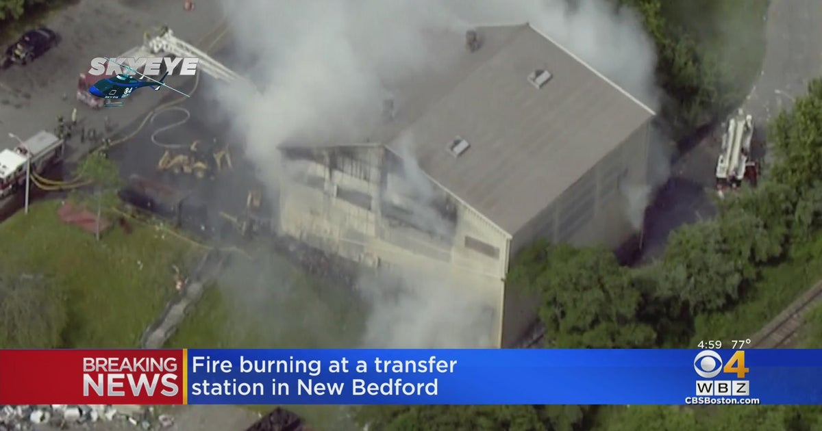 Fire burns at transfer station in New Bedford - CBS Boston